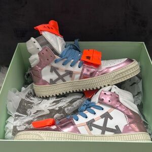 Stylish Pink and White High-Top Sneakers